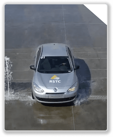 Car driving through flood water